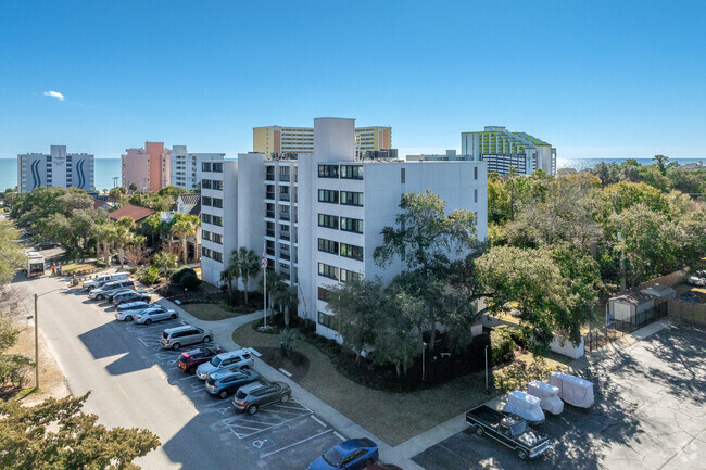 From street towards ocean. - The Cane Patch Condominiums