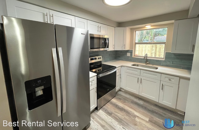 Building Photo - 4 br, 1.5 bath House - 6041 101ST AVE N