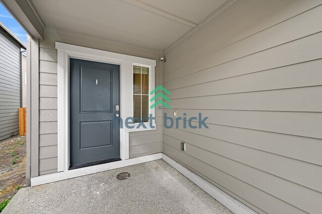 Foto del edificio - "Charming 4-Bedroom Home in Puyallup with Spacious 1831 Sq Ft Layout & 2.5 Baths!"