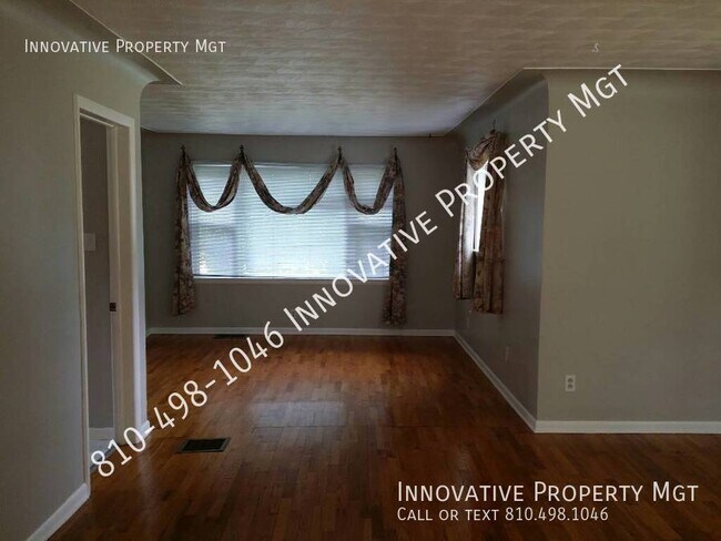 Building Photo - Spacious 4 bedroom , 1 1/2 bath home in Ga...