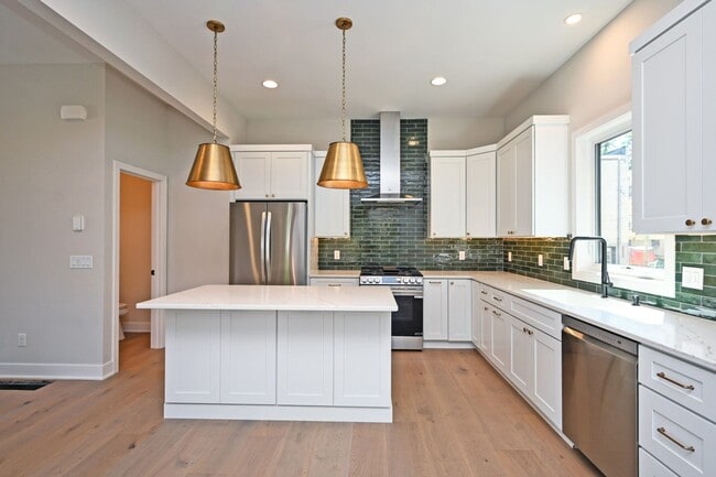 Building Photo - Stylish, Sustainable & Low-Maintenance Liv...