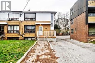 Building Photo - 100 Rajah St