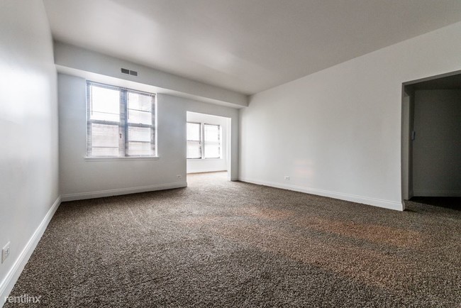Building Photo - 4 br, 2 bath Apartment - 5046 S Champlain Ave