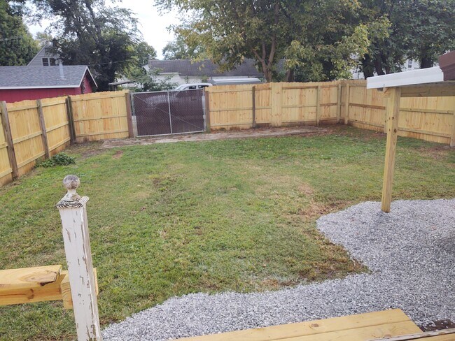 New fenced backyard - 306 Oak St