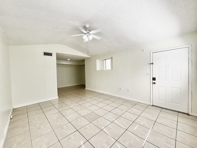 Spacious living room and main entrance - 15591 SW 105th Ter