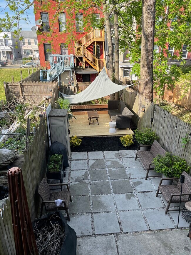 Backyard - Not a current picture, backyard will be cleaned and restored before renting - 82 Astor Plz