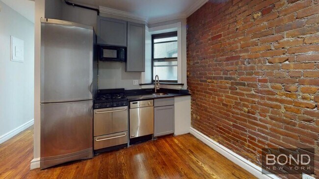 Foto del edificio - 221 E 23rd St