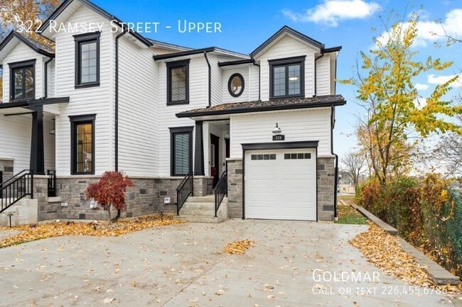 Building Photo - Stunning 2 level home with water views ava...