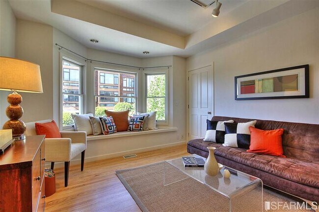 Living room closet at far right is fitted with shelving and is extra deep. Cable is wired and ready - 343 Union St