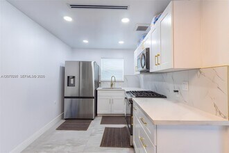 Building Photo - 233 W 39th Pl