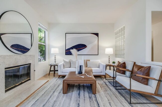 Building Photo - Charming 2-Bed/2.5-Bath Townhome in the He...