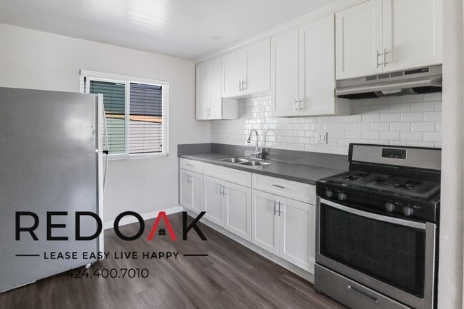 Building Photo - Sunny And Spacious Two Bedroom With, Stain...