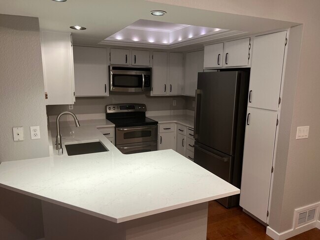 New countertops, fridge and dishwasher - 1308 Bellevue Way NE