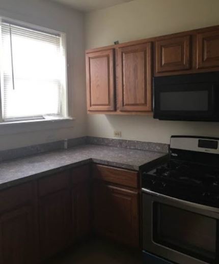 Building Photo - 1651 W 76th St