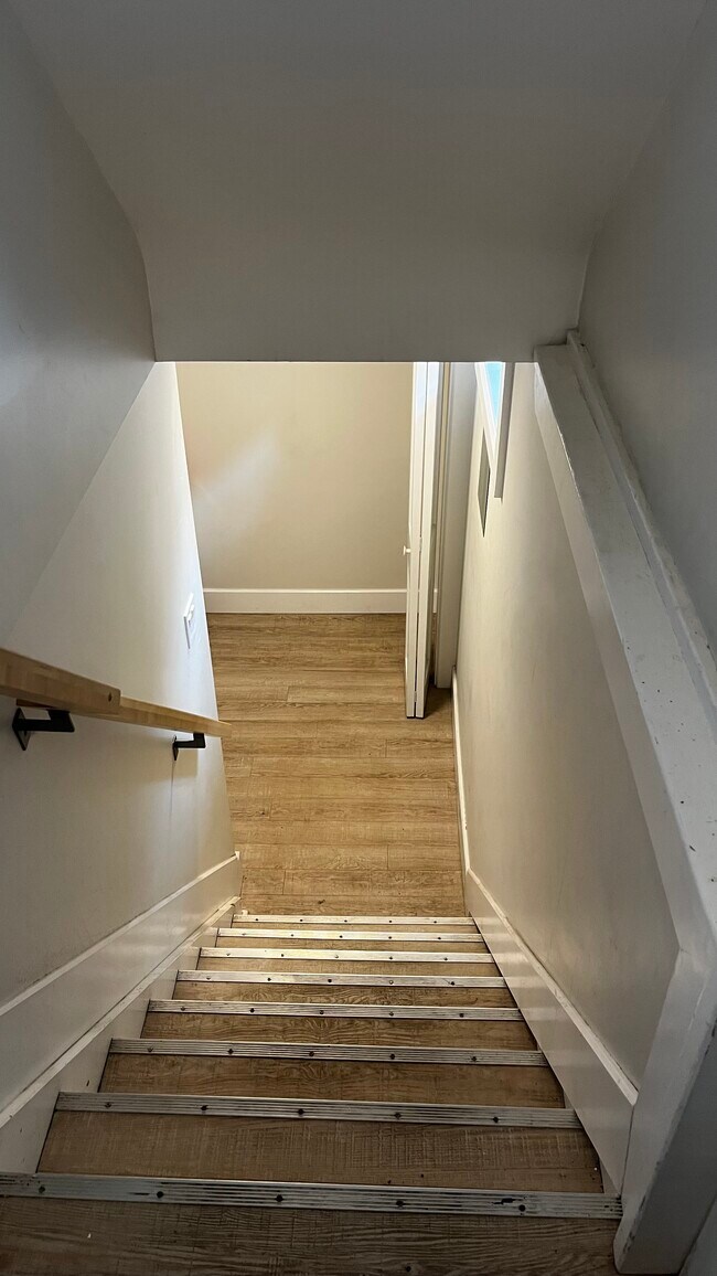 stairs lead down to a large closet - 1118 Woodroffe Av