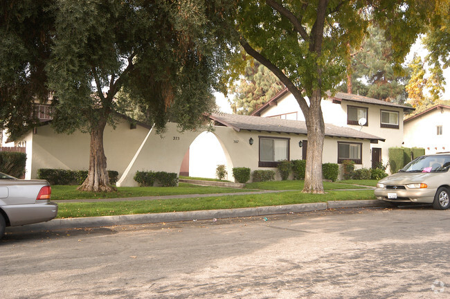 Building Photo - Four Fourplexes