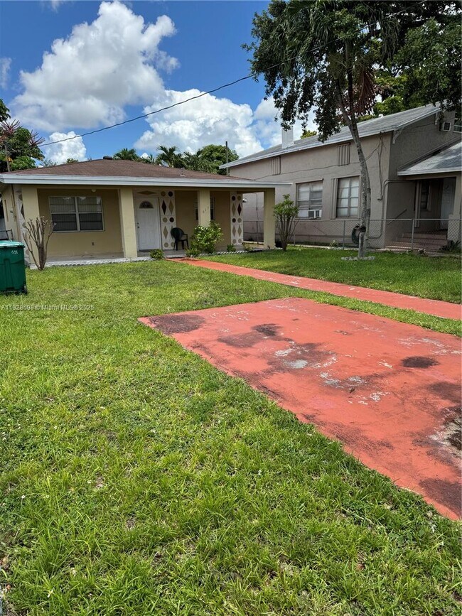 Building Photo - 613 NW 58th Ave