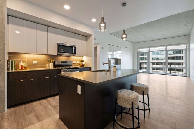 Building Photo - The Confidential