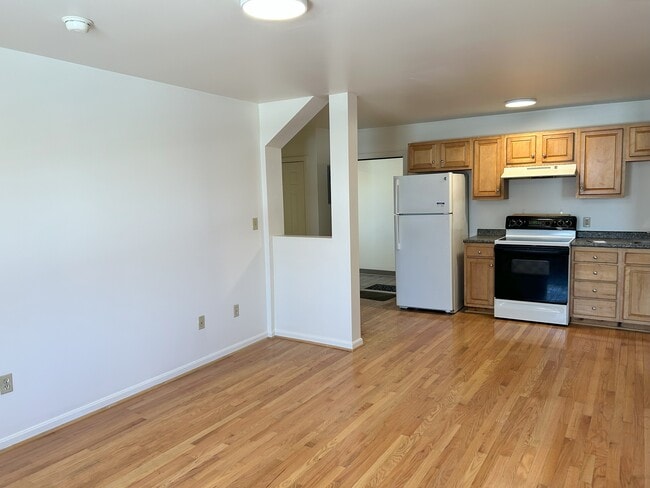 Living area with hardwood floors - 444 Sawyer St
