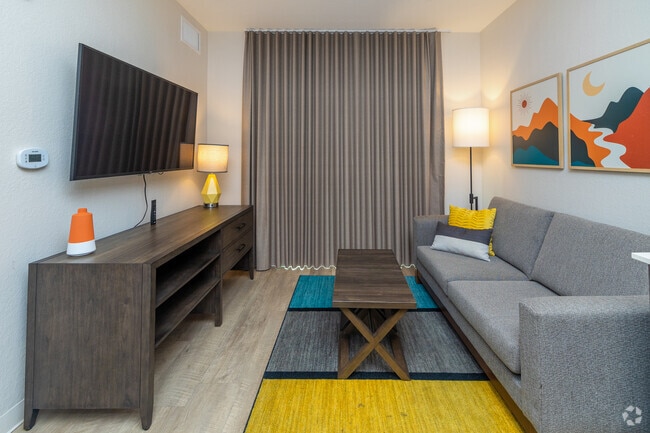 1BR,1BA - 550SF-Living room - Waterwalk Jacksonville - Deerwood Park