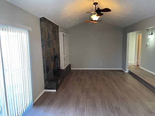 Building Photo - New paint and new bathroom tile!  Spacious...
