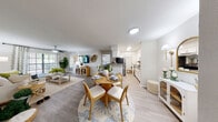 Located at 8781 White Swan Dr in Tampa, FL, this single-floor home offers four bedrooms and two full bathrooms across a well-utilized layout. The open-concept living and dining area serves as the heart of the home, featuring light wood-look flooring, neutral walls, and a ceiling fan that enhances airflow throughout the space. Large windows dressed with patterned curtains invite abundant natural light and provide pleasant outdoor views, creating a bright and welcoming ambiance.

The kitchen is designed in a galley style, outfitted with white cabinetry, stainless steel appliances, and ample counter space on both sides. A skylight overhead adds extra natural brightness to this functional cooking space, which also provides convenient access to a laundry area.

The primary bedroom is a comfortable retreat, complete with a ceiling fan, natural light from a window, and a walk-in closet with built-in shelving. Additional bedrooms are well-proportioned, each featuring ceiling fans and closet access, offering versatility for various living arrangements.

Both bathrooms are finished with clean white tile tub-and-shower combinations, wood-look flooring, and vanities with ample storage. The consistent use of neutral tones and light finishes throughout the home creates a cohesive, calm aesthetic that feels both modern and livable.