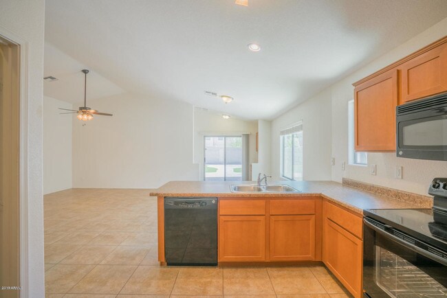 Building Photo - 9847 W Melinda Ln