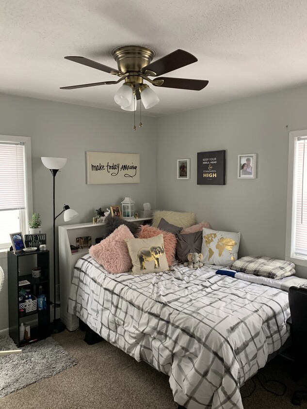 Bedrooms have nice size windows and a big closet. Rooms are furnished with a bed, dresser, and desk. Each bedroom has its only ceiling fan. - 1414 30th St