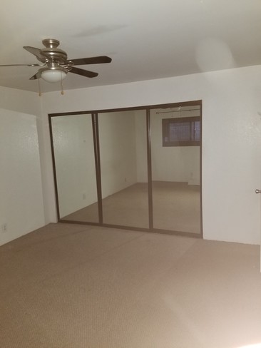 Upstairs bedroom mirror closets - 200 Elm Ave