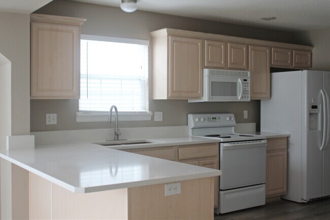 Foto del edificio - 9763 N Lewis Ave