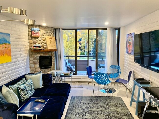 Living Room with stone fireplace - 333 Vine St