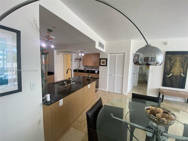 Building Photo - 10275 Collins Ave