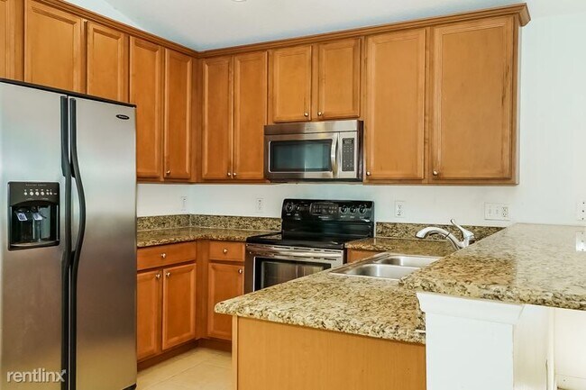 Building Photo - 4 br, 2 bath House - 642 Coral Trace Boule...