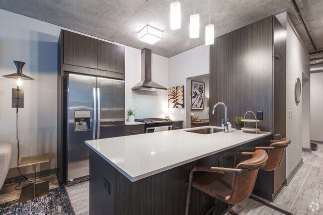 1BR, 1BA + Den - 870SF - Kitchen - Nordhaus Apartment Homes