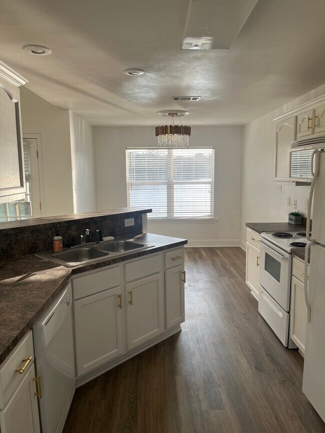 kitchen and dining areas - 56327 Frank Pichon Rd