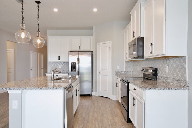 Foto del edificio - Lovely 3/2 Spacious Home with a Covered Pa...