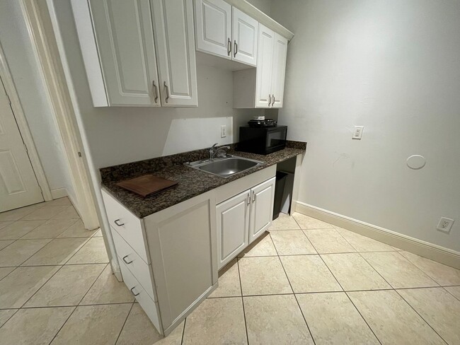 Building Photo - ANNUAL RENTAL - EFFICIENCY APT-STUDIO WITH FULL BATH