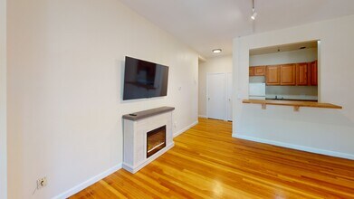 Building Photo - Flats on Comm