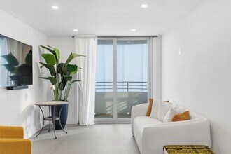 Building Photo - 5555 Collins Ave