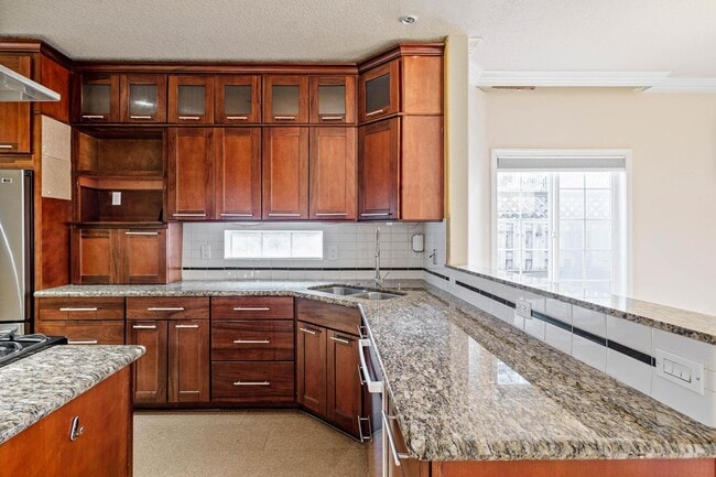 Building Photo - $500 move-in special! Unique 2-bdrm/2.5-bath duplex w/ A/C—Private patio, storage, garage w/ wash...