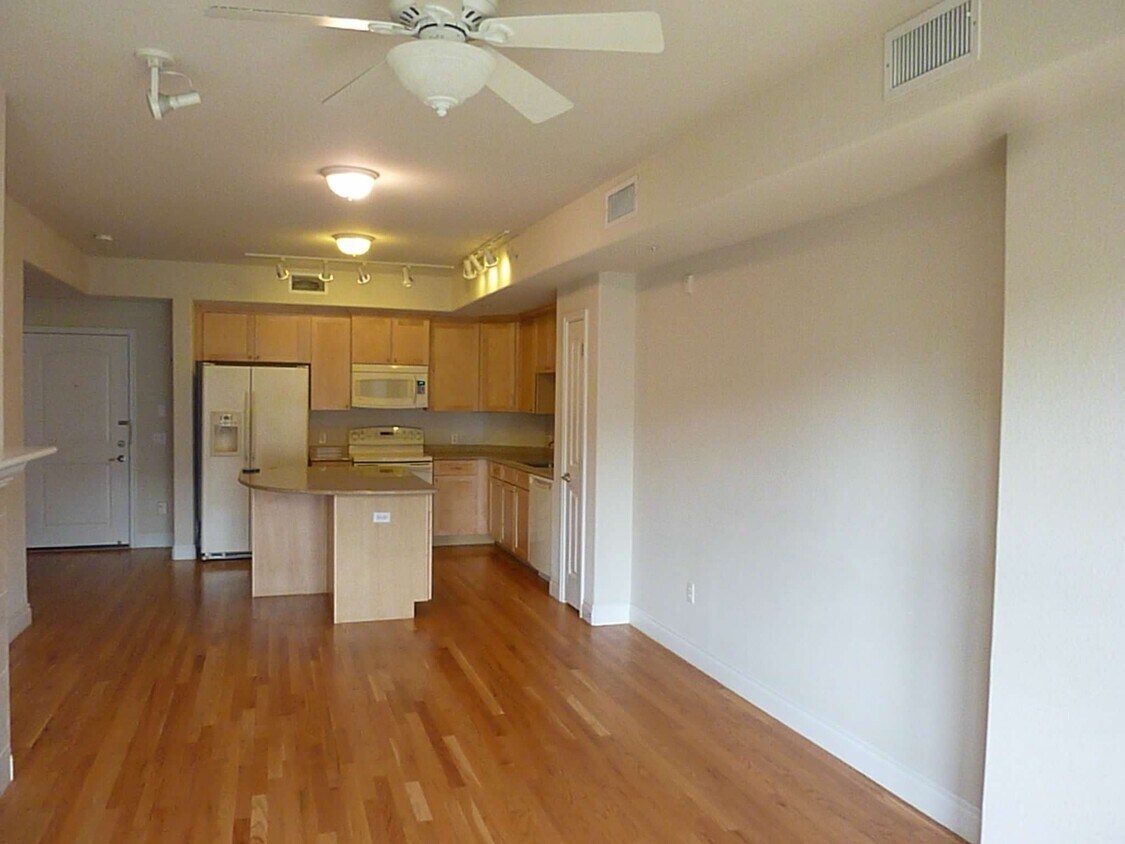 livingroom w/ fireplace and kitchen - 660 11th St