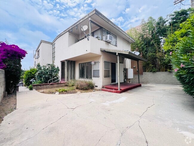 Building Photo - 1142 S Serrano Ave