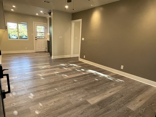 Living Room/Dinning Room (dual pane windows, lots of natural light, recessed dimmable lighting) - 3211 W Alameda Ave