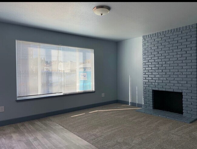 Living room w/ plush carpet, Fireplace - 8651 Santa Paula Way