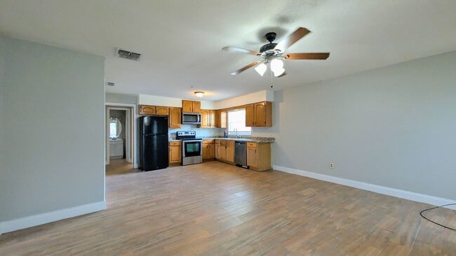 Photo - 2 bedroom 2 bath with an updated kitchen, bathrooms, and tile flooring throughout. House