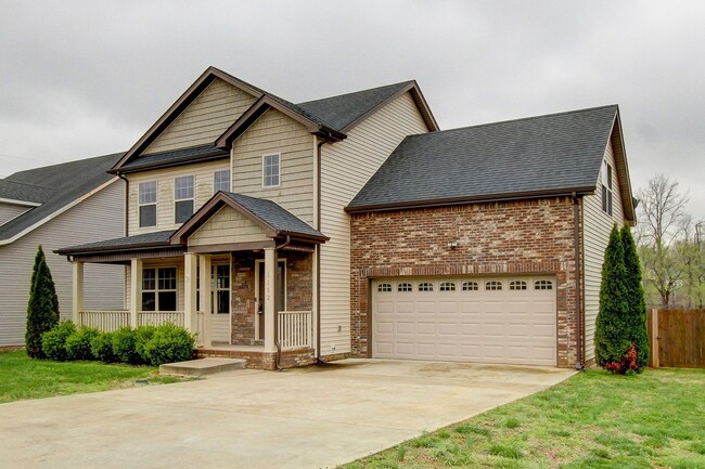 Building Photo - Stunning Home With Covered Front Porch, Fi...