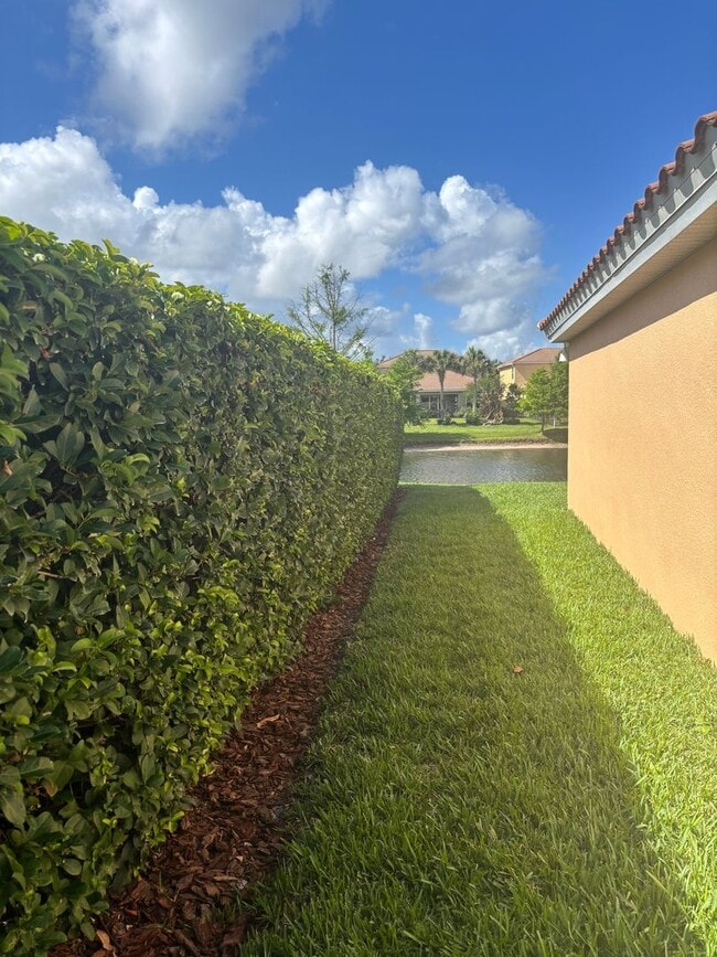 Photo - AGENT SHOWINGS ONLY! Gorgeous 2/2 + Den Mediterranean Villa with Waterfront Screened Patio and 2-... House