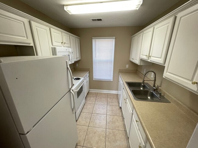 Building Photo - 77-83 Gray Hawk Drive 4-Plex