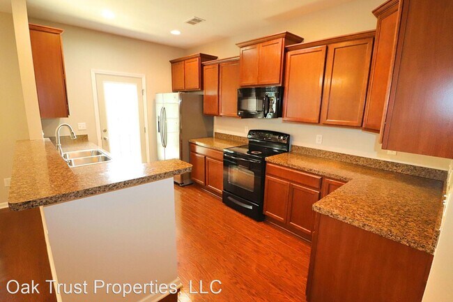 Building Photo - 3 br, 2.5 bath House - 2509 Stadium Dr.