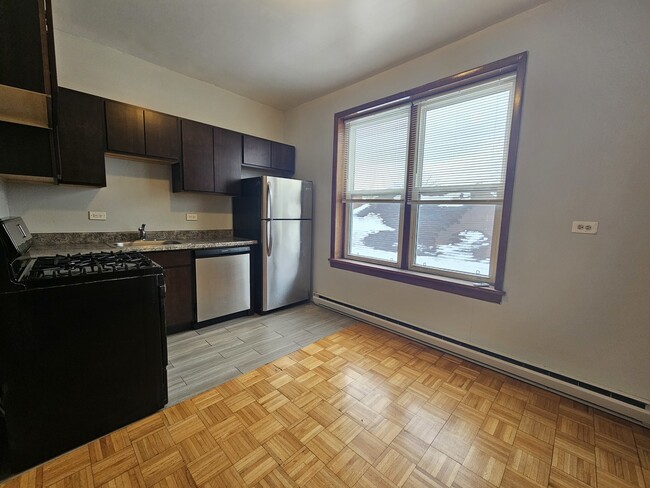 Foto del edificio - 4810 N Christiana Ave